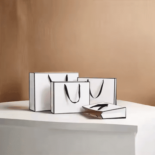 DE-LIANG Luxury White Craft Paper Bags Fashionable Printed Custom Logo Clothing Shopping Gift Customizable Luxury Packaging